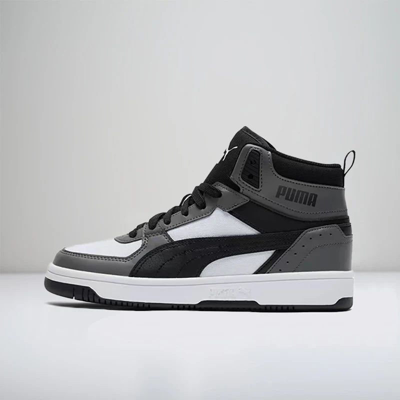 Baskets basses décontractées Puma Rebound Joy, offrant un maintien optimal, une coupe ajustée, une grande durabilité, un confort et un amorti (unisexe), en gris et noir, modèle 387875-01.
