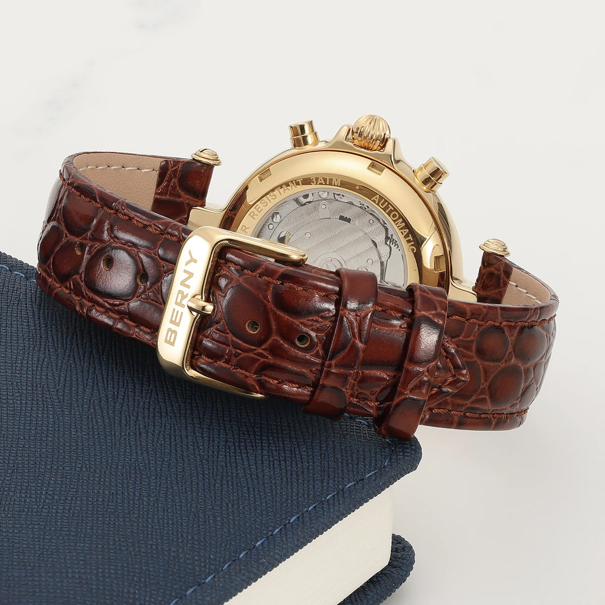 Montre automatique pour homme BERNY, style rétro, avec affichage Soleil et Lune, aiguilles luminescentes et mouvement ST1652 ; une montre mécanique classique et élégante, dotée d'un bracelet en cuir véritable.