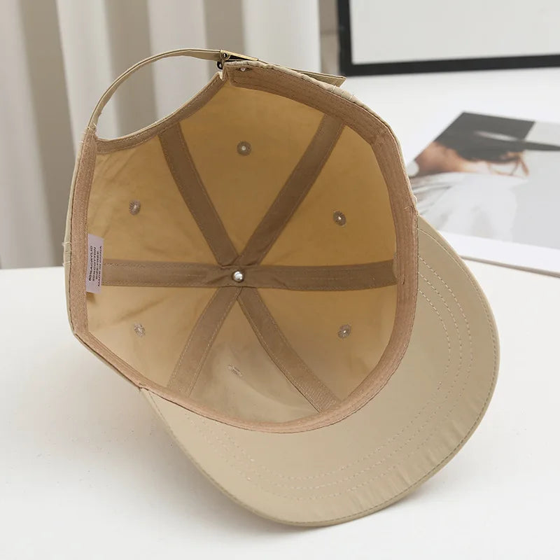 Eine Herren-Kappe mit kurzer Krempe, neuer Sommer-Style, atmungsaktive und schnell trocknende Baseballkappe, leichte Soft-Top-Duckbill-Kappe für Damen
